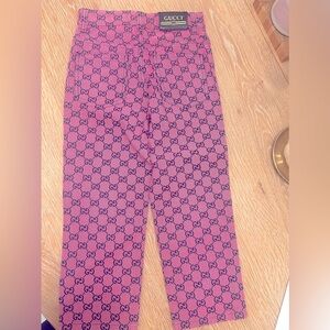 Beautiful gucci jeans for girls ( used) like new . As is